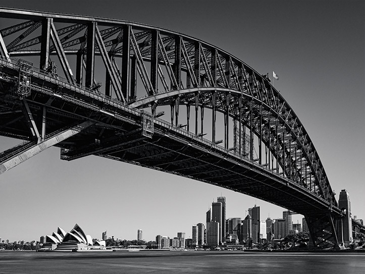 sydney grand harbour bridge opera house shadows black white paul reiffer photographer