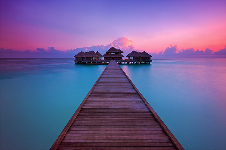 Huvafen Fushi Sunrise Dawn Maldives Overwater Spa Paul Reiffer Professional Landscape Photograph Photographer Pink Blue Sea Ocean Jetty Wooden Per Aquum