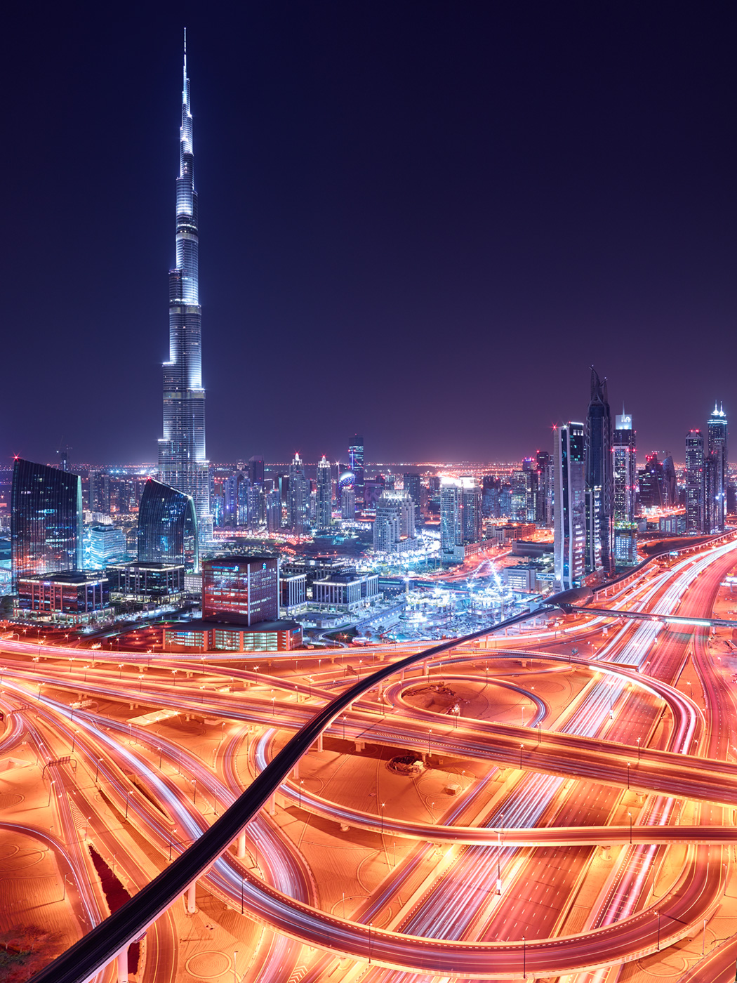 dubai burj khalifa road intersection freeway UAE night cityscape skyline skyscrapers downtown city of gold image copyright paul reiffer no reproduction permitted