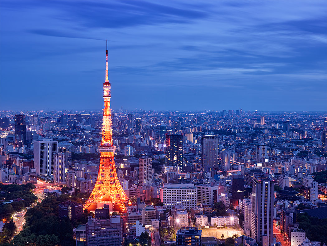 tokyo tower at dusk night lights blue sky city below from above long exposure lights orange background cityscape paul reiffer photographer 2015