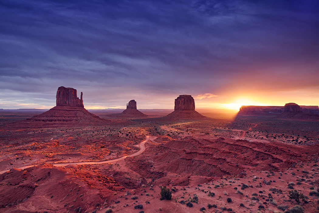 Morning Sunrise Red Mittens View Monument Valley Sun Flare Clouds Soft Warm Glow Navajo Nation Park Paul Reiffer Professional Landscape Photographer
