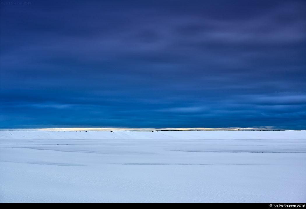 blue lagoon sky clouds snow contrast horizon ice winter lines horizontal paul reiffer professional photographer abstract iceland