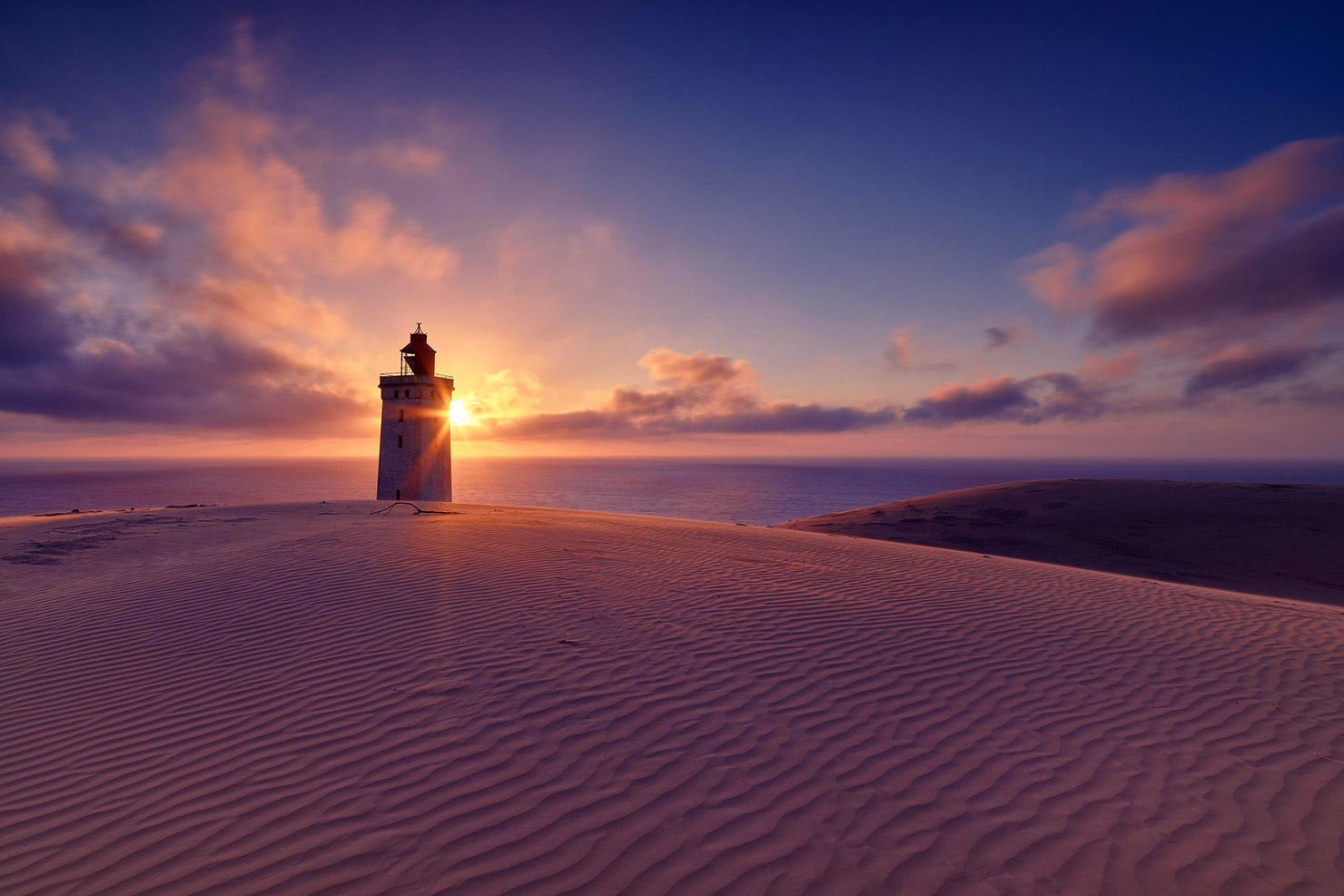 Hidden Hide and Seek Rubjerg Knude Lighthouse Sunset Flare Sun Sand Erosion Covered Denmark Aalborg Paul Reiffer Photographer Copyright