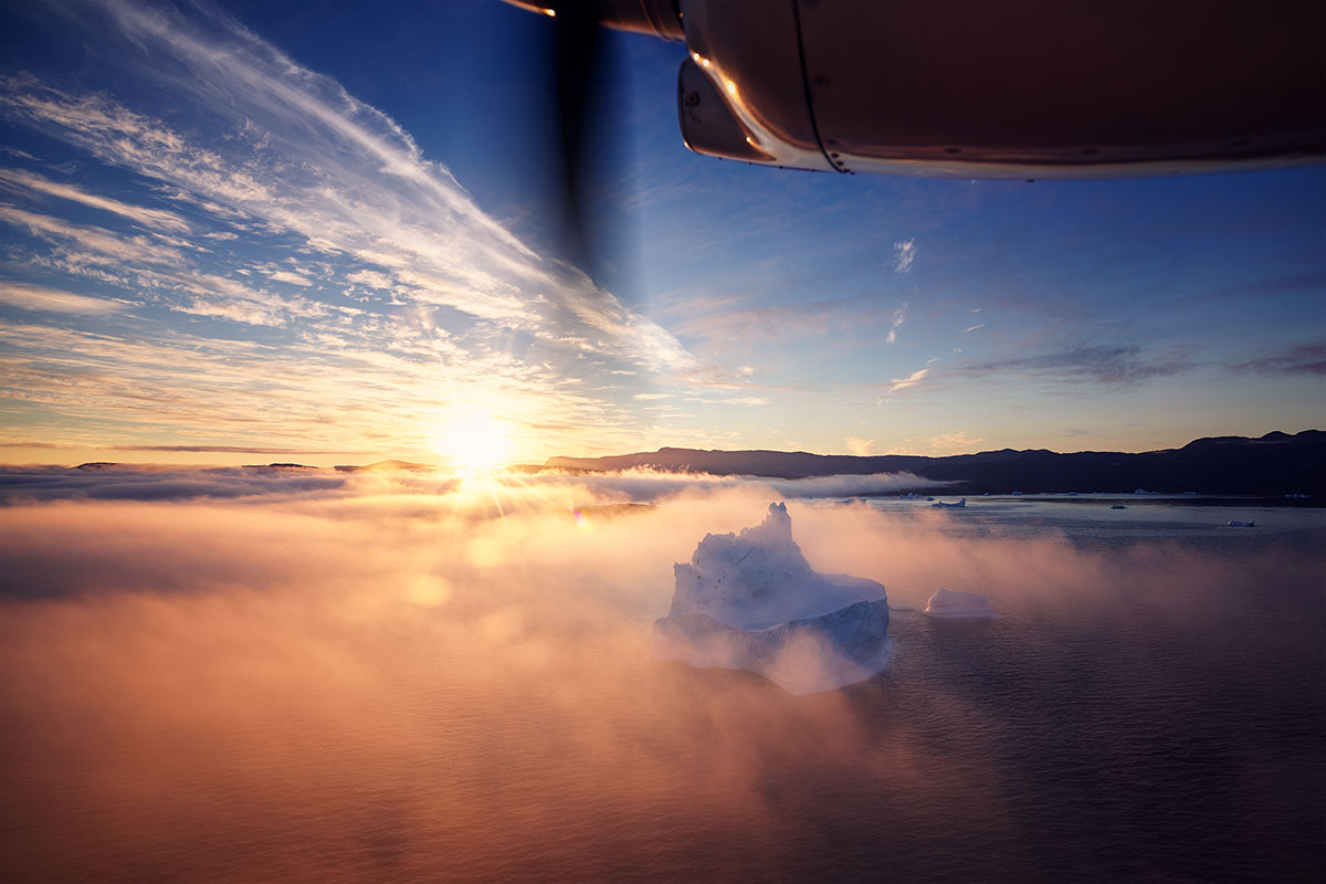 Paul Reiffer Greenland Iceberg Photography Workshops Landscape Location Expedition Glacier Ice Aerial Above Plane Engine Window Mist Fog Ilulissat Private Luxury All Inclusive Photo Phase One