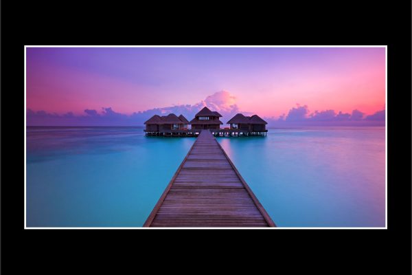 product picture Overwater Huvafen Fushi Jetty Sunrise Pink Sky Blue Water Ocean Maldives Wooden Hut buy limited edition print paul reiffer photograph photography