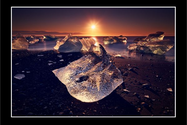 product picture Diamond Sun Flare Sunrise Beach Black Sand Jokulsarlon Iceland Ice Blocks Iceberg Glacier buy limited edition print paul reiffer photograph photography