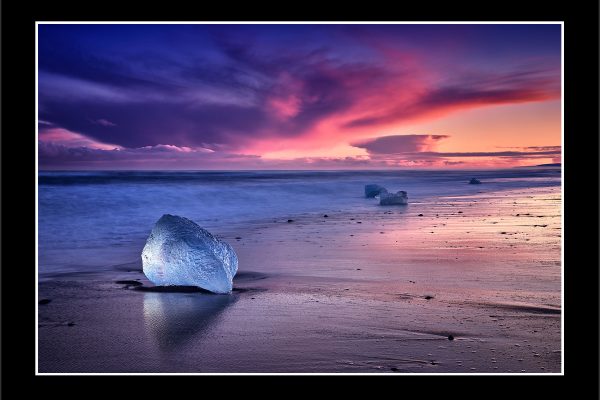 product picture Solitaire Diamond Beach Black Sand Jokulsarlon Sunset Iceland Pink Sky Ice Block Iceberg buy limited edition print paul reiffer photograph photography