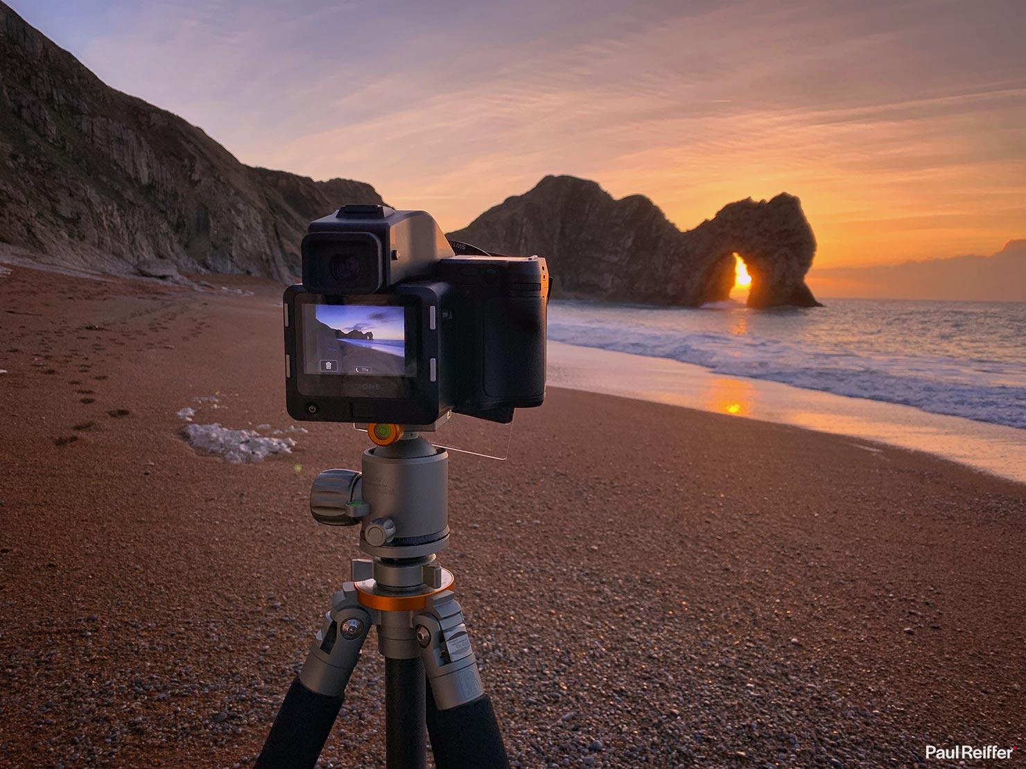 BTS Sun Flare Rising Through Arch Durdle Door Beach Sunrise Winter Light Coast Dorset South England Paul Reiffer Landscape