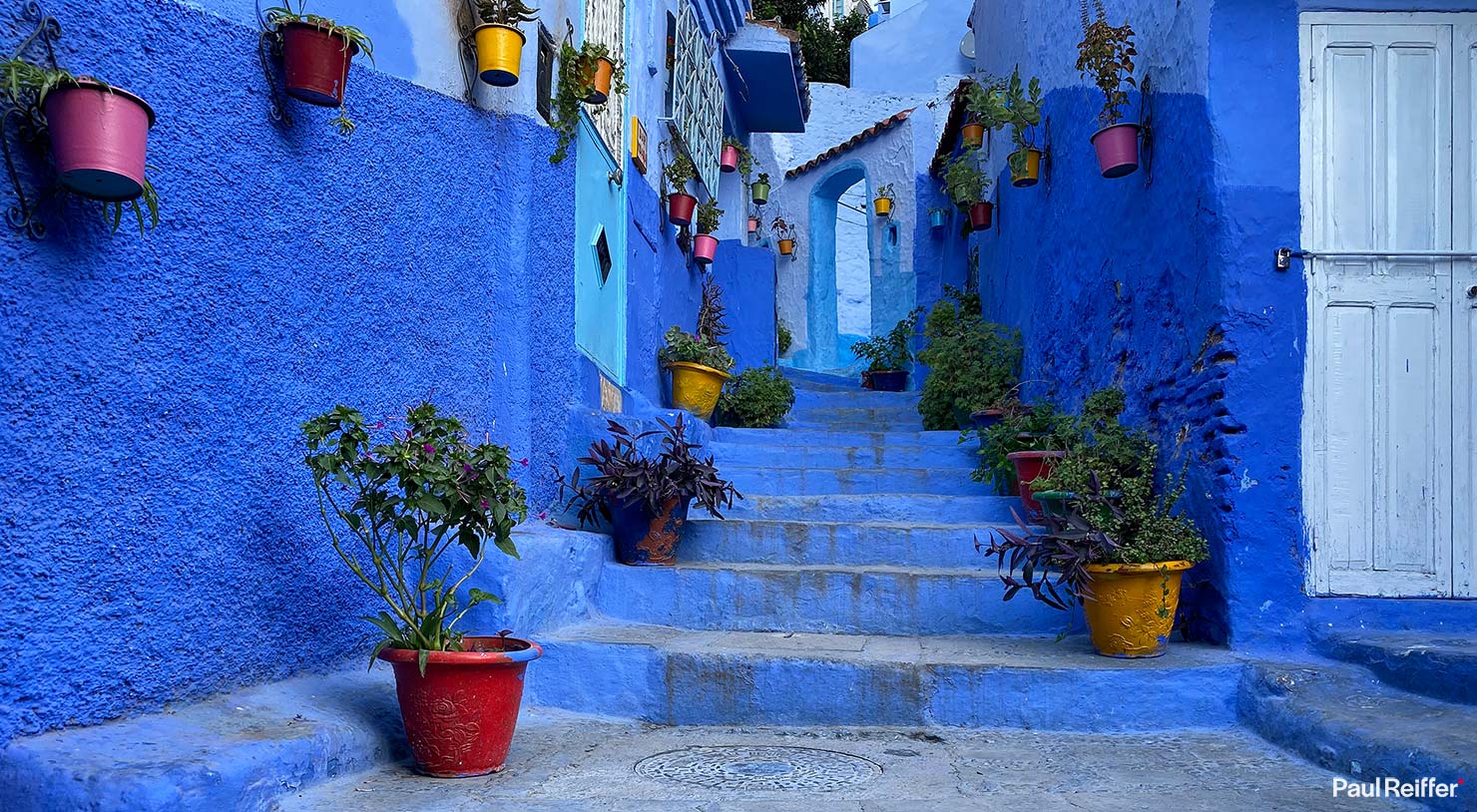Famous Blue Steps Yellow Flowerpots Postcard Chefchaouen Morocco Locations Early Morning City Street Paul Reiffer Photographer iPhone Travel Photography Apple Landscape