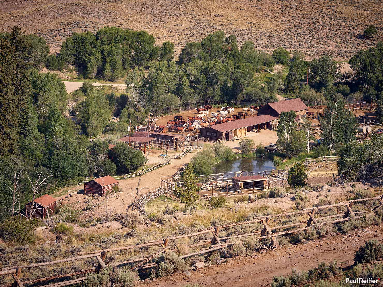 Bitterroot View Corral Hilltop Distant Panorama Saddle Mountains Remote Setup Paul Reiffer Wyoming Ranch US West Cowboy Fox Family Photographs Dubois Jackson WY