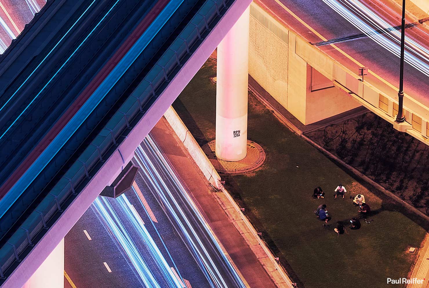 50 percent crop sheikh zayed road interchange lights night city paul reiffer long exposure traffic trails people phones sitting capture one livestream cityscape@2x